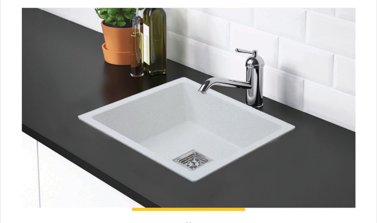 Lime Stone 16 by 18 inch quartz kitchen sink installed with chrome faucet