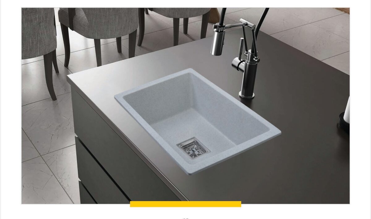 Lime Stone 24 by 18 inch quartz kitchen sink installed