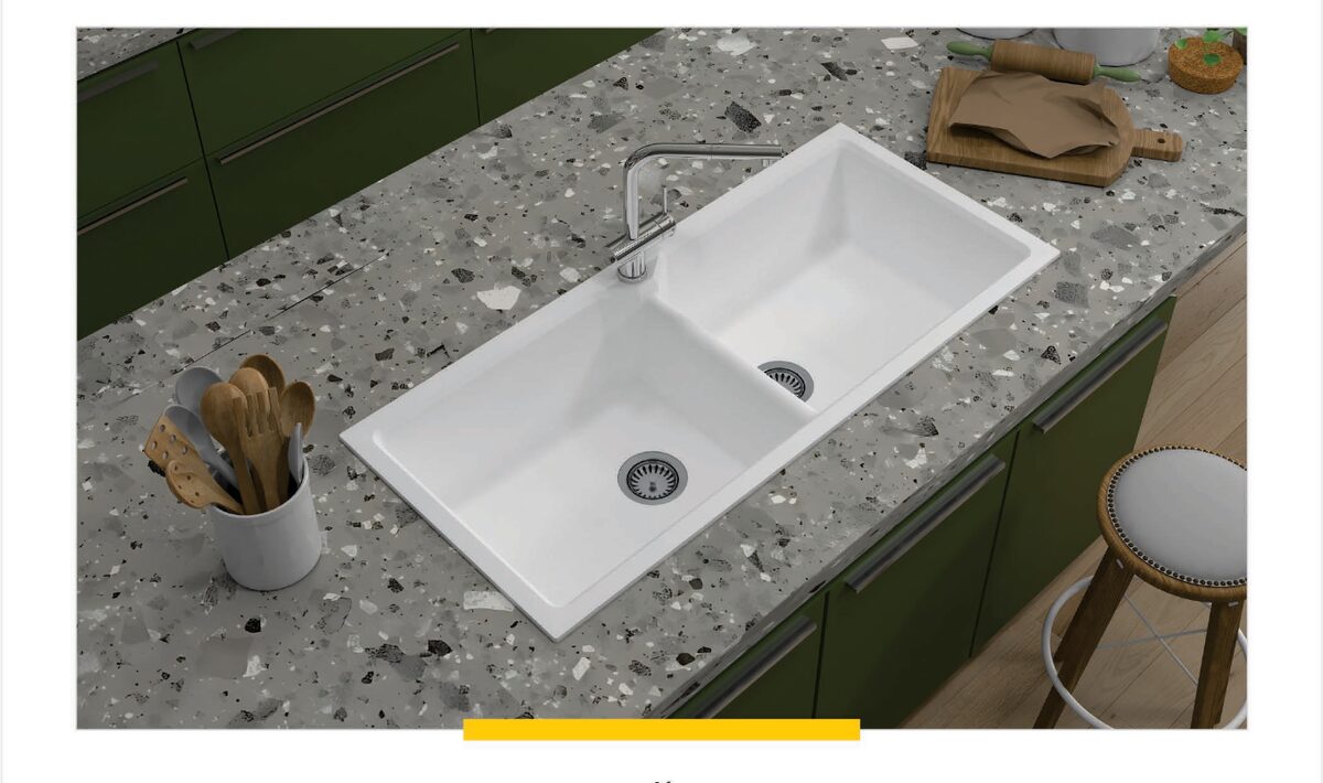 Lime Stone double bowl quartz kitchen sink installed on a countertop